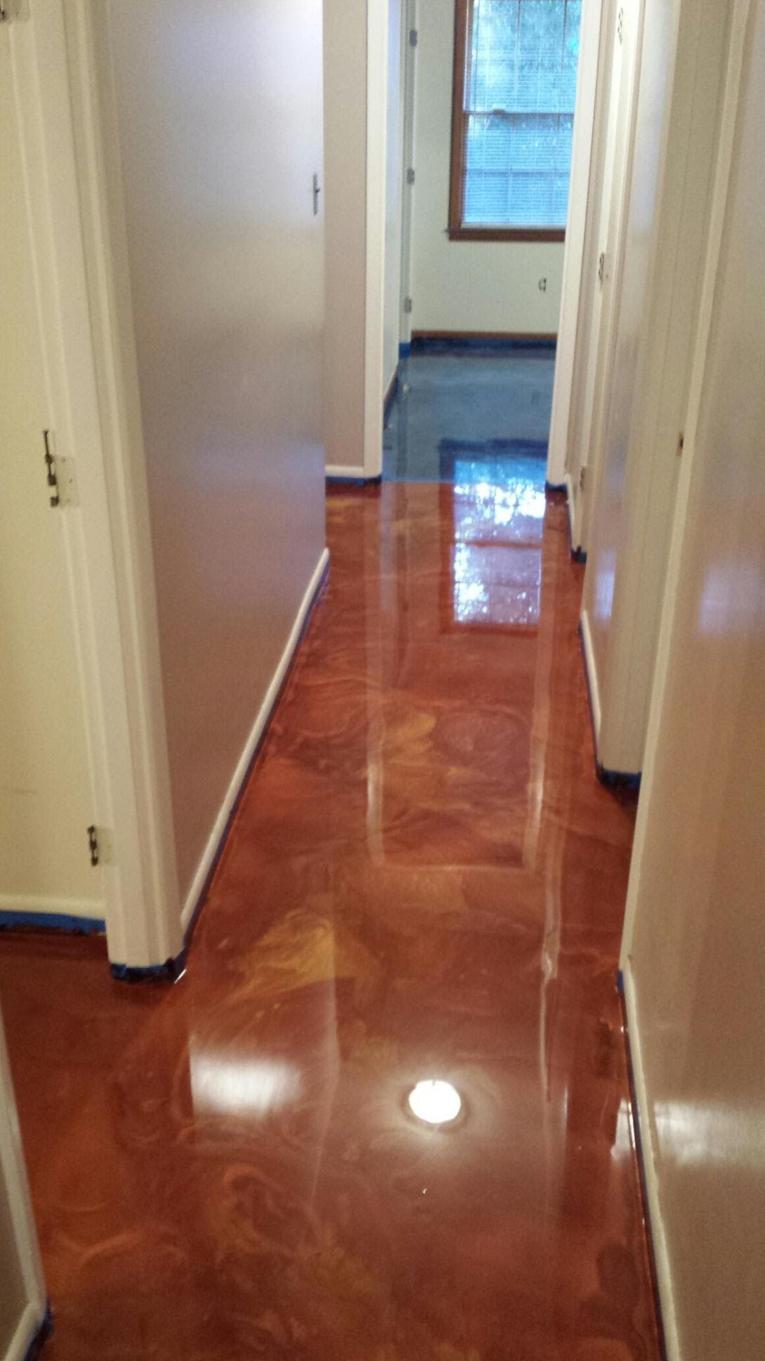 Copper metallic epoxy floor in residential hallway Savannah GA