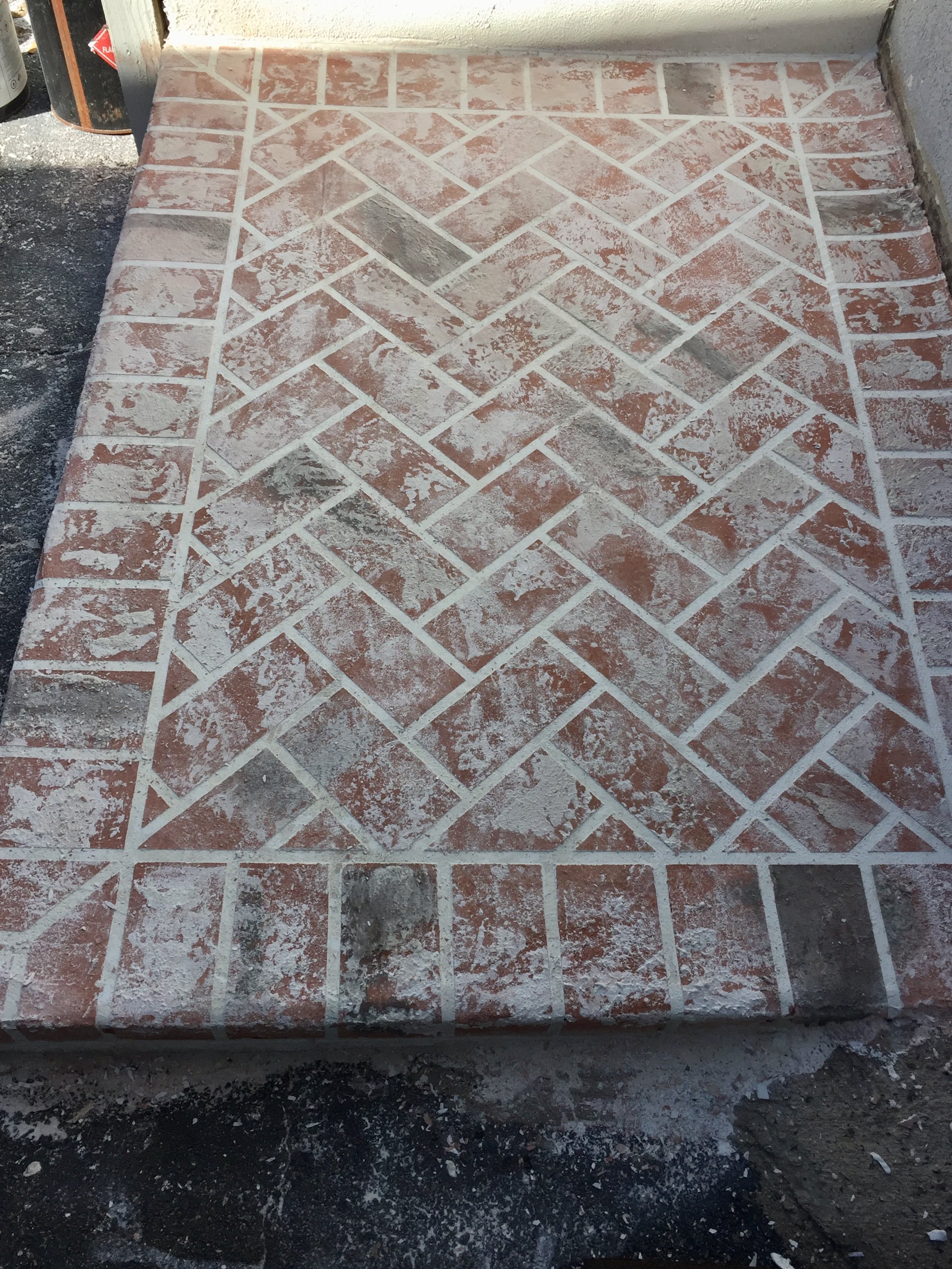 Herringbone brick pattern concrete overlay patio Savannah GA